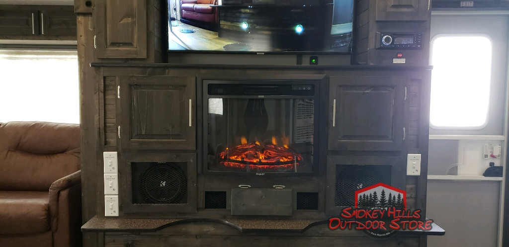 Custom Media Center with subwoofers and two amps in Ice Castle Fish House